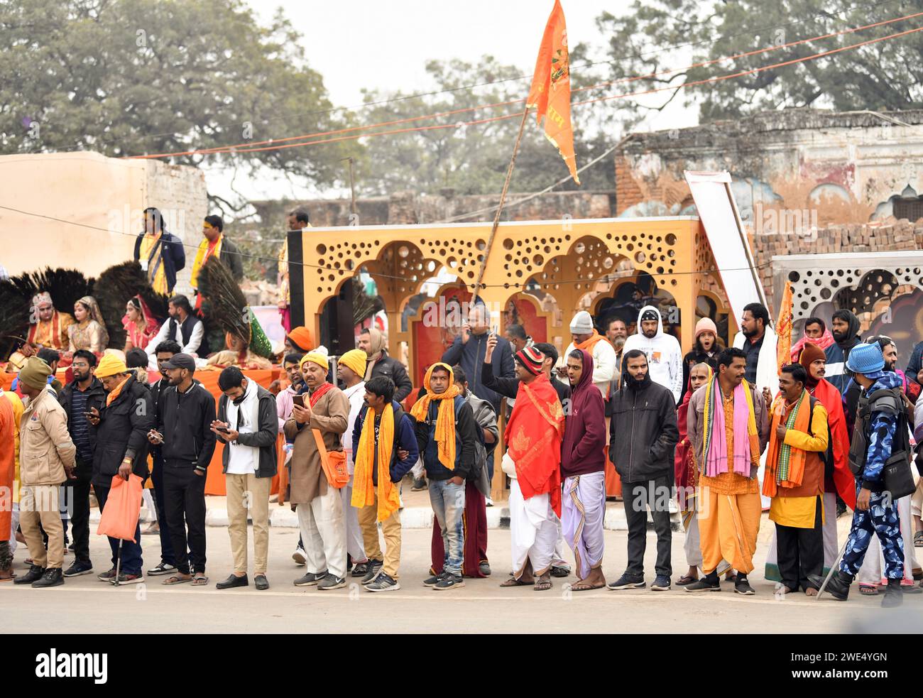 Ayodhya Jan 22 ANI Security Personnel Stand Guard As Devotees Stand ayodhya-jan-22-ani-security-personnel-stand-guard-as-devotees-stand