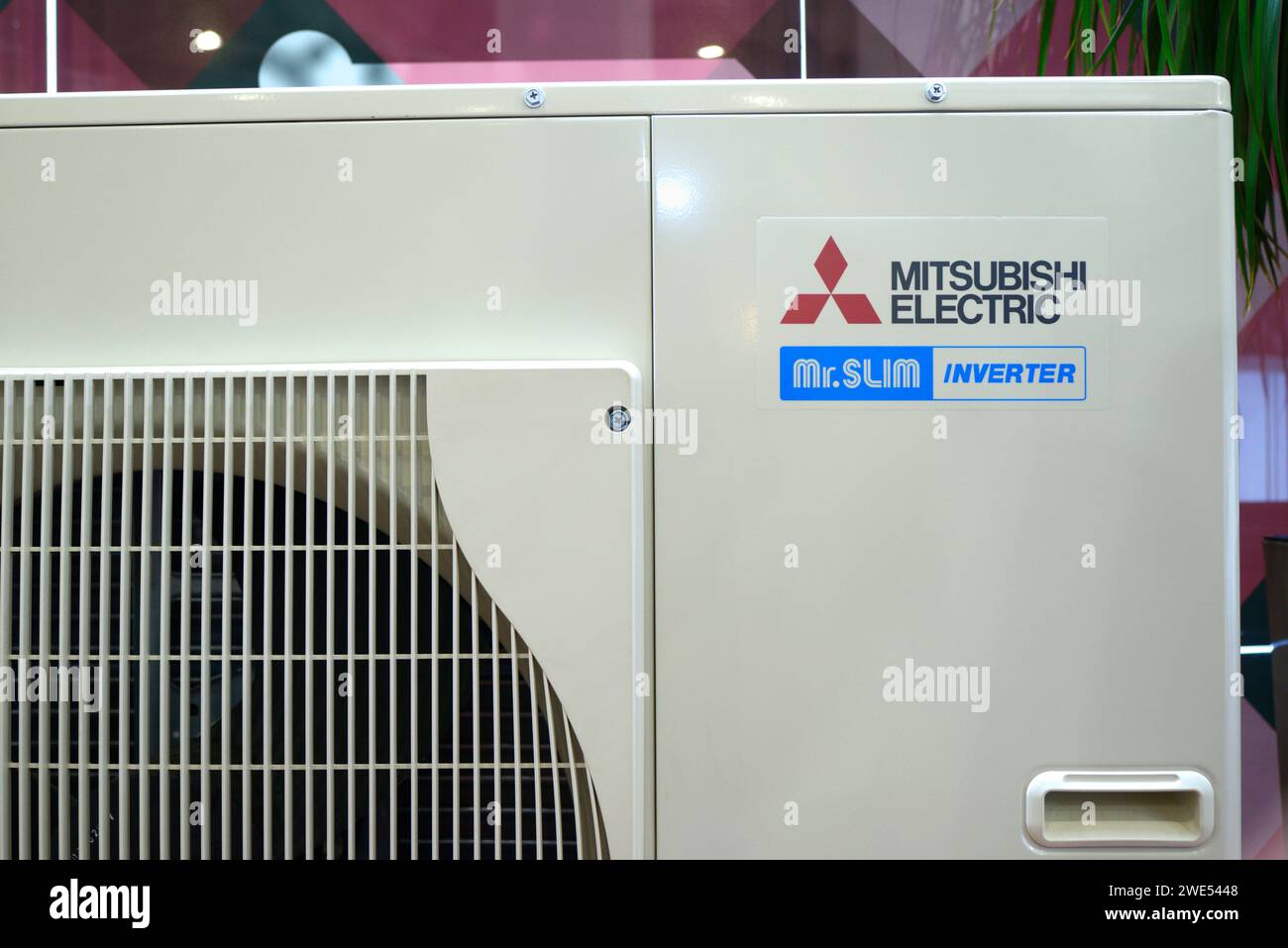 Modern air conditioner inverter Mitsubishi Electric set on stand during ...