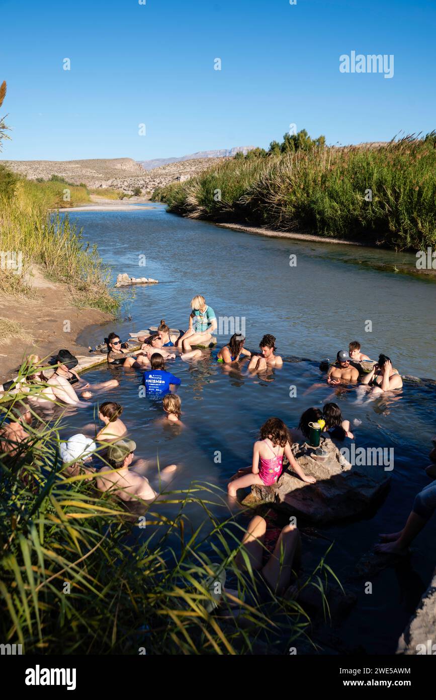 Photograph of tourists enjoying the historic Langford Hot Springs. Big