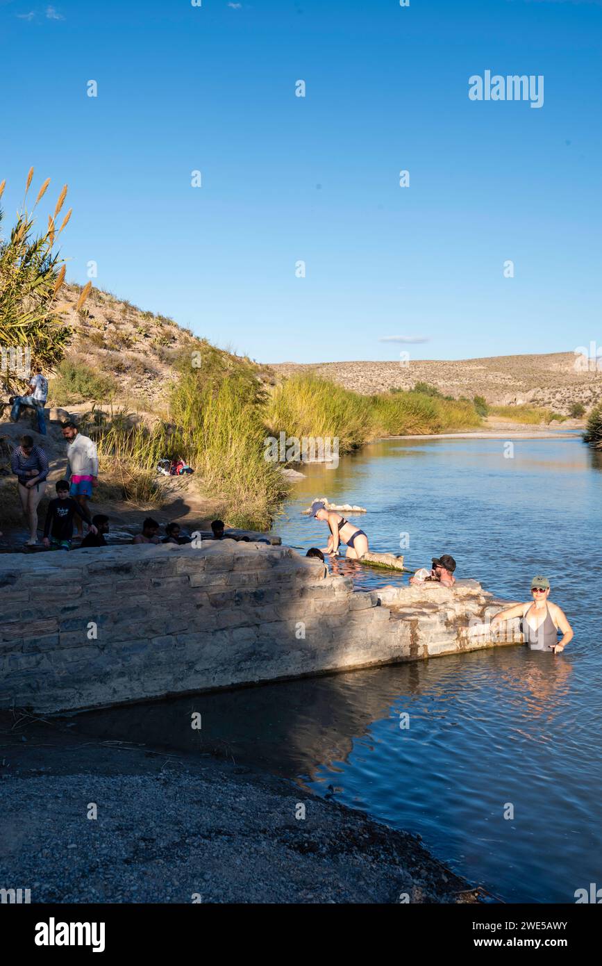 Photograph of tourists enjoying the historic Langford Hot Springs. Big