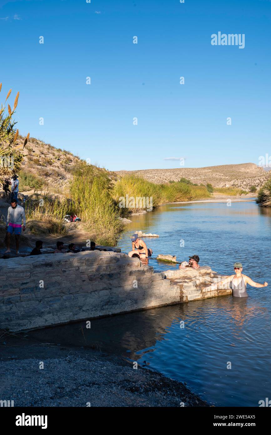 Photograph of tourists enjoying the historic Langford Hot Springs. Big