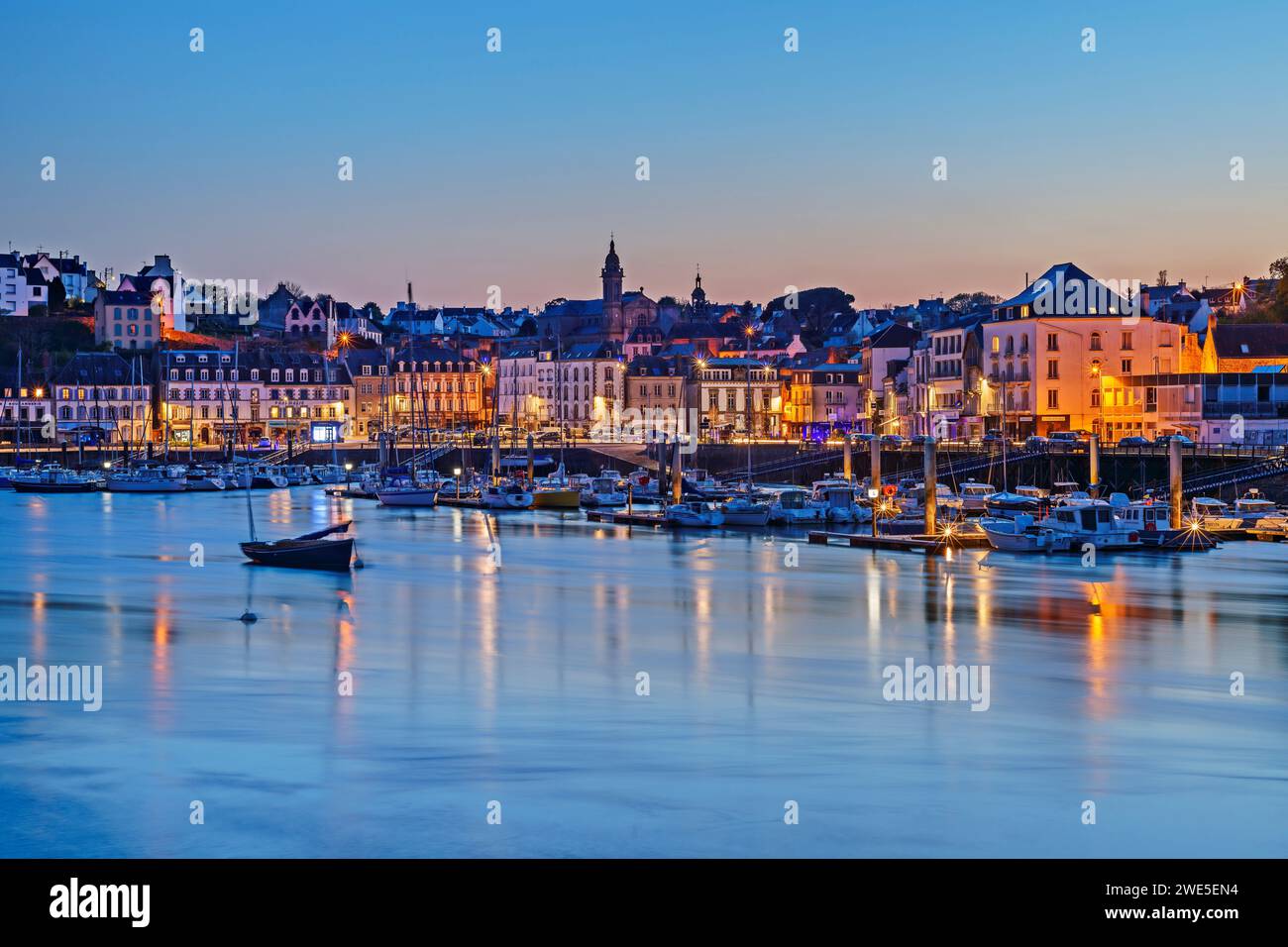 Illuminated town of Audierne with harbor, Audierne, Cap-Sizun, Brittany, France Stock Photo
