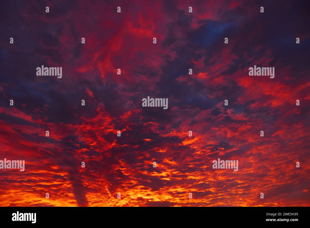 Sunrise or sunset dramatic view with clouds. Dramatic clouds background photo. Stock Photo