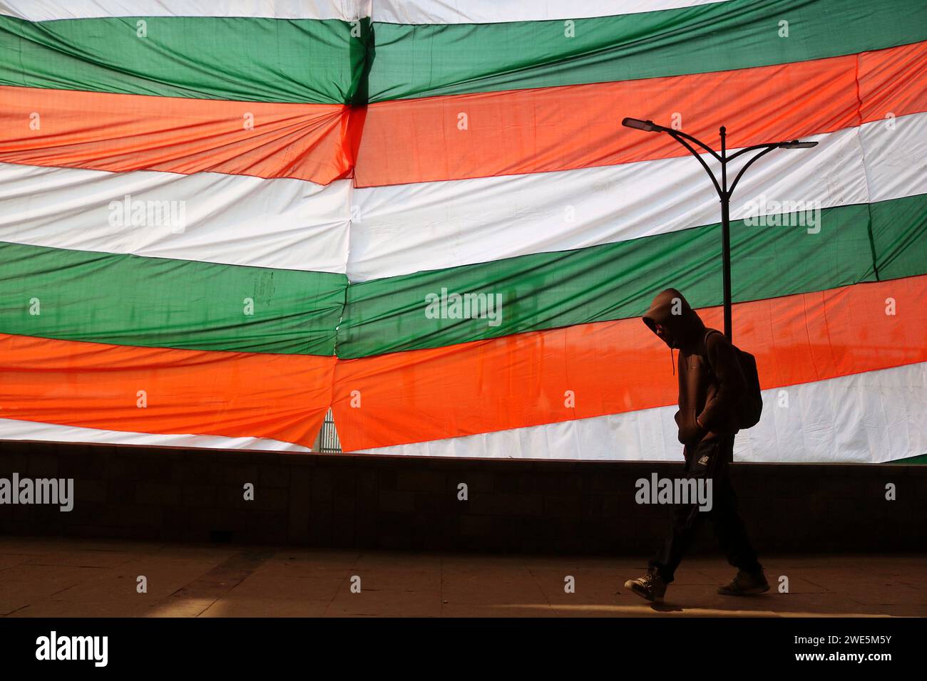 Srinagar, India. 23rd Jan, 2024. January 23, 2024, Srinagar Kashmir, India A man walks past a