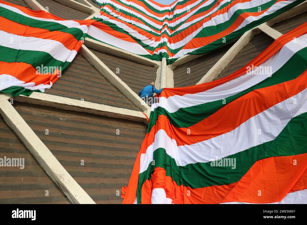 Srinagar Kashmir India 23rd Jan 2024 Government Employees Drape The   Srinagar Kashmir India 23rd Jan 2024 Government Employees Drape The Periphery Of An Indoor Stadium Building With A Giant Indian Tri Color Ahead Of Indias Republic Day In Srinagar Republic Day In India Commemorates The Adoption Of The Constitution And The Countrys Transition To A Republic On 26 January 1950 With Celebrations Taking Place On The Same Date Each Year On January 23 2024 Srinagar Kashmir India Credit Image Firdous Nazireyepix Via Zuma Press Wire Editorial Usage Only! Not For Commercial Usage! 2WE5M6Y 