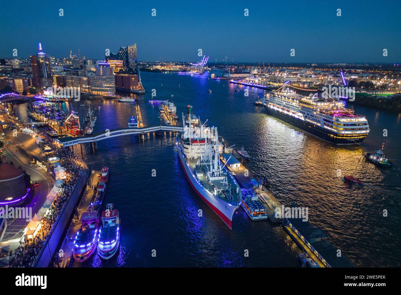 Aerial view of the museum ship Cap San Diego and the cruise ship Vasco da Gama (nicko cruises) during the Hamburg Cruise Days 2023 at night, Hamburg, Stock Photo
