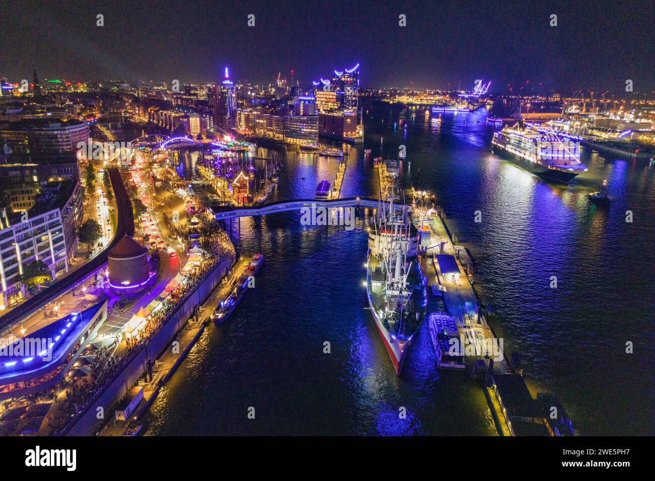 Aerial view of the museum ship Cap San Diego and the cruise ship Vasco da Gama (nicko cruises) during the Hamburg Cruise Days 2023 at night, Hamburg, Stock Photo