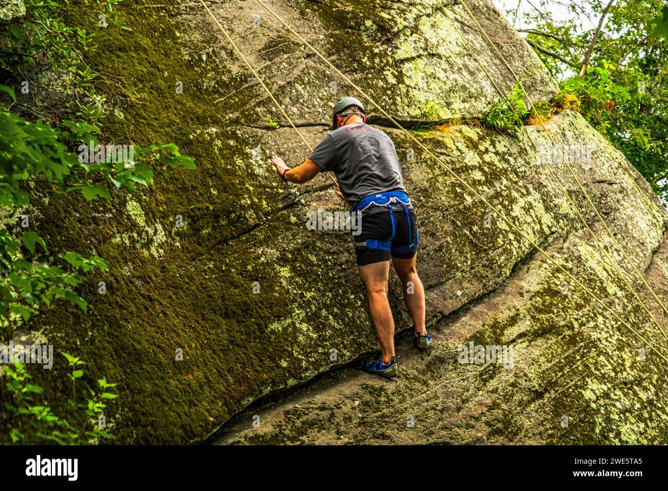 Rock Climber at Chimney Rock State Park in North Carolina Stock Photo