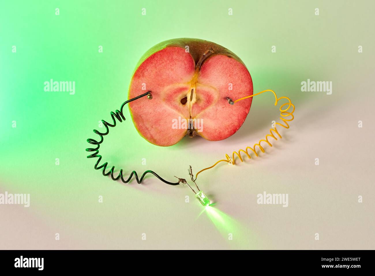 Free energy electricity generator using apple close up Stock Photo Alamy