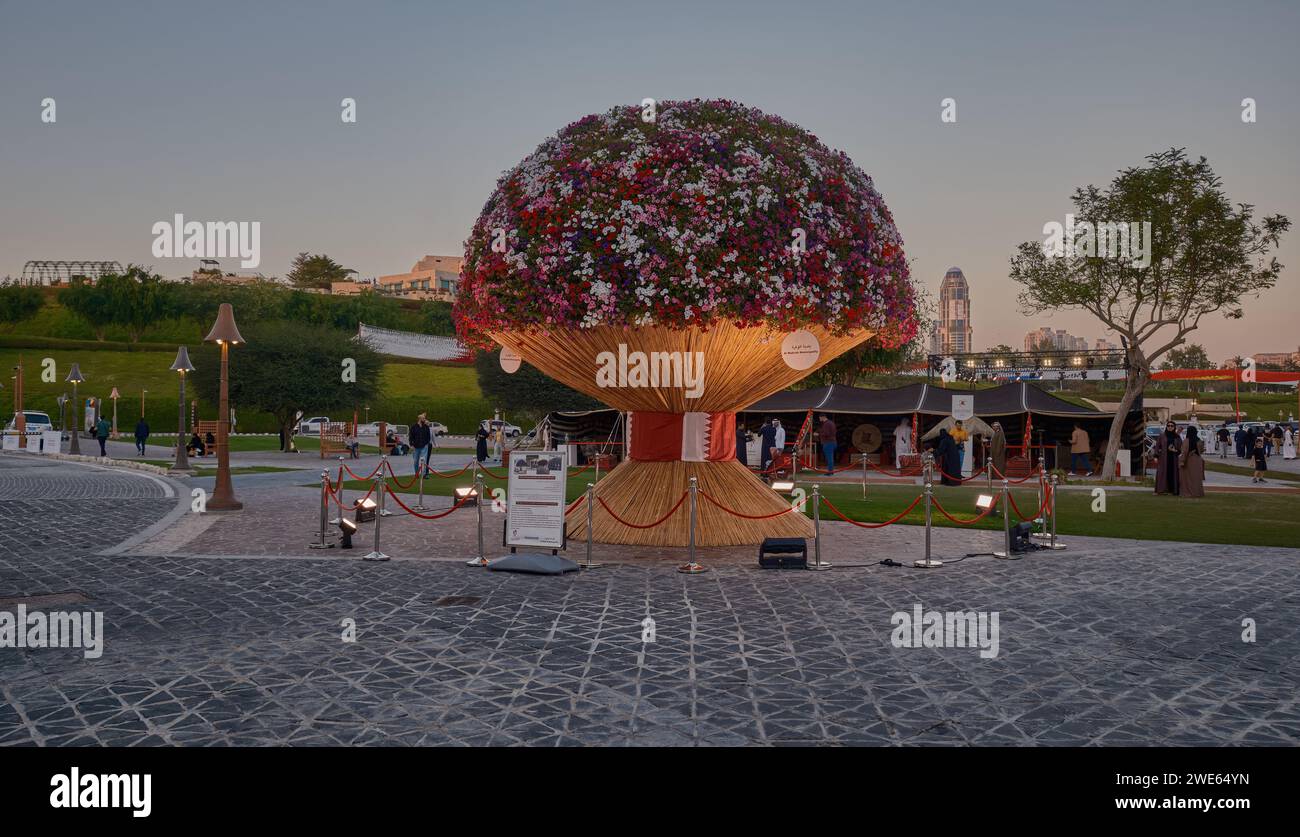 Large Flower Bouquet in Katara  Doha, Qatar registered in the Guinness World records inaugurated by The Ministry of Municipality .Sunset view Stock Photo