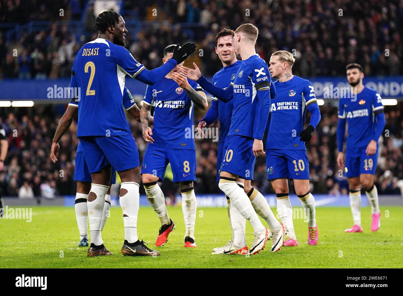 Chelsea's Cole Palmer (centre right) celebrates scoring their side's fourth goal of the game with team-mates during the Carabao Cup semi final second leg match at Stamford Stadium, London. Picture date: Tuesday January 23, 2024. Stock Photo