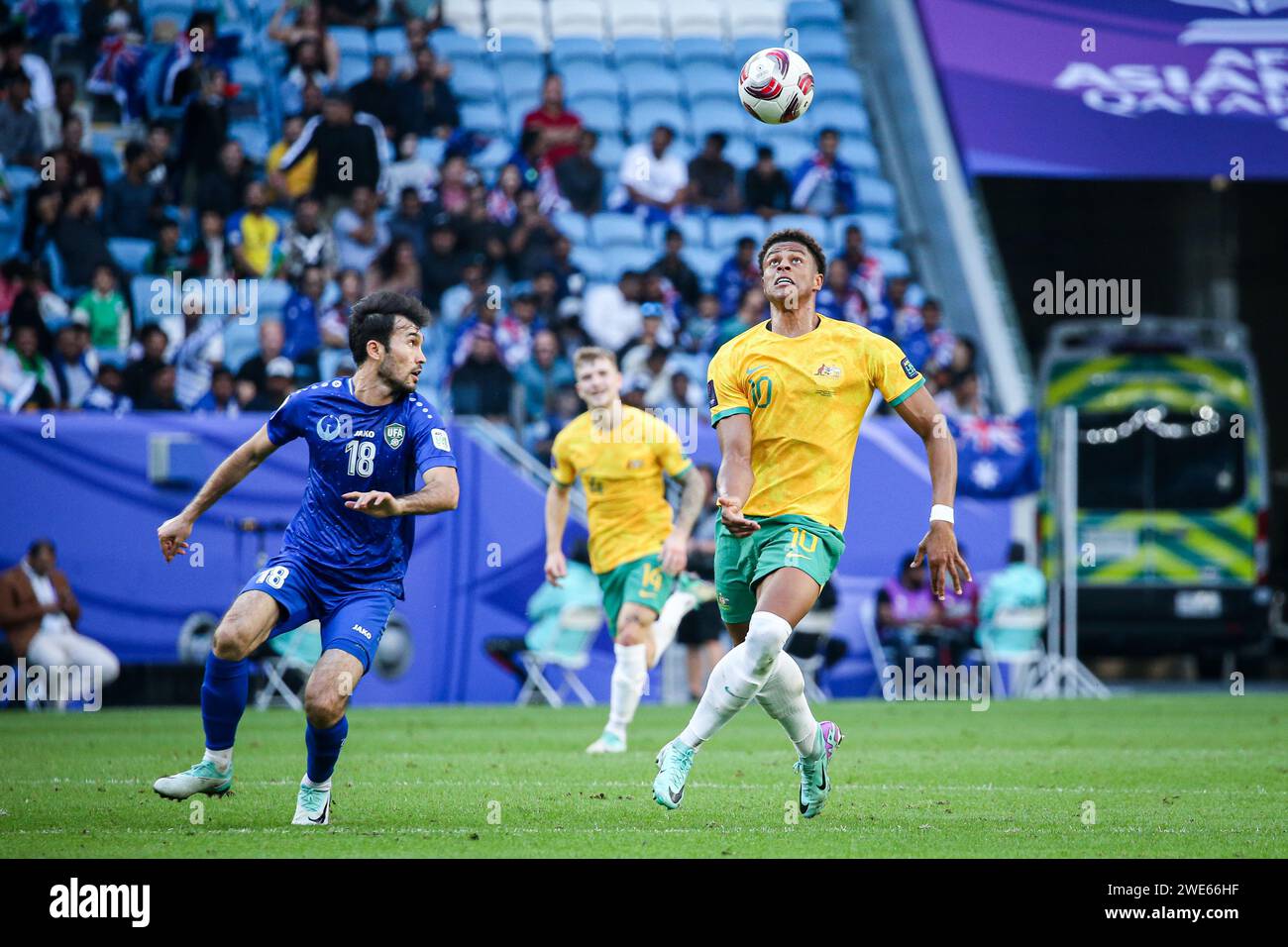 Doha, Qatar, 23 Jan 2024, AFC Asian Cup Qatar 2023 Group B - Australia 1:1 Uzbekistan, Australia’s Martin Boyle and Uzbekistan’s Azizbek Turgunboev scored. Fans cheering for their teams advancing to last 16. Image: Kusini Yengi Stock Photo