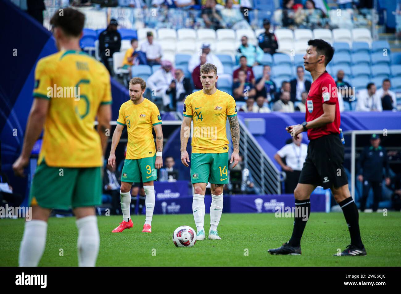 Doha, Qatar, 23 Jan 2024, AFC Asian Cup Qatar 2023 Group B - Australia 1:1 Uzbekistan, Australia’s Martin Boyle and Uzbekistan’s Azizbek Turgunboev scored. Fans cheering for their teams advancing to last 16. Stock Photo