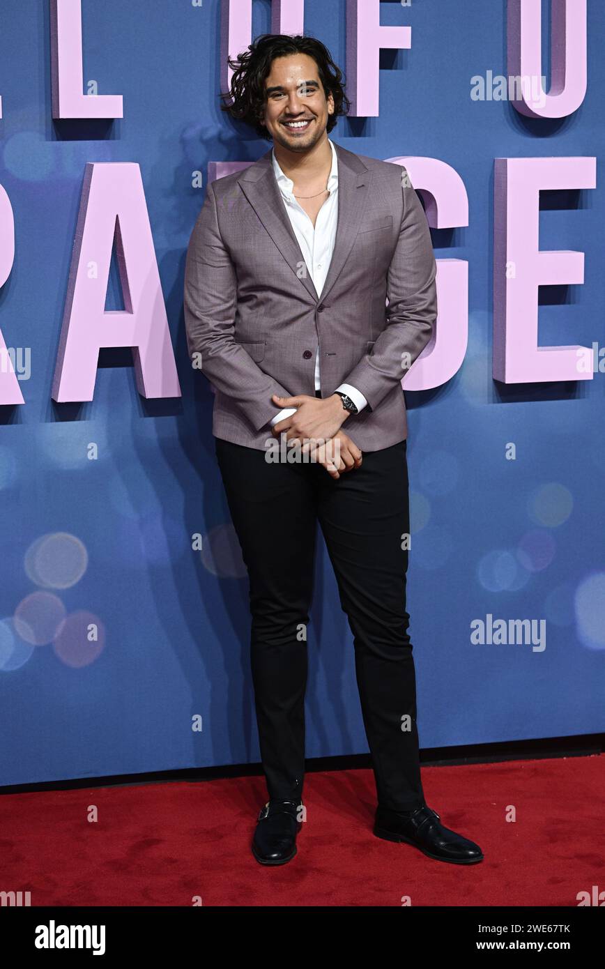 Nathaniel Curtis poses for photographers upon arrival at the premiere