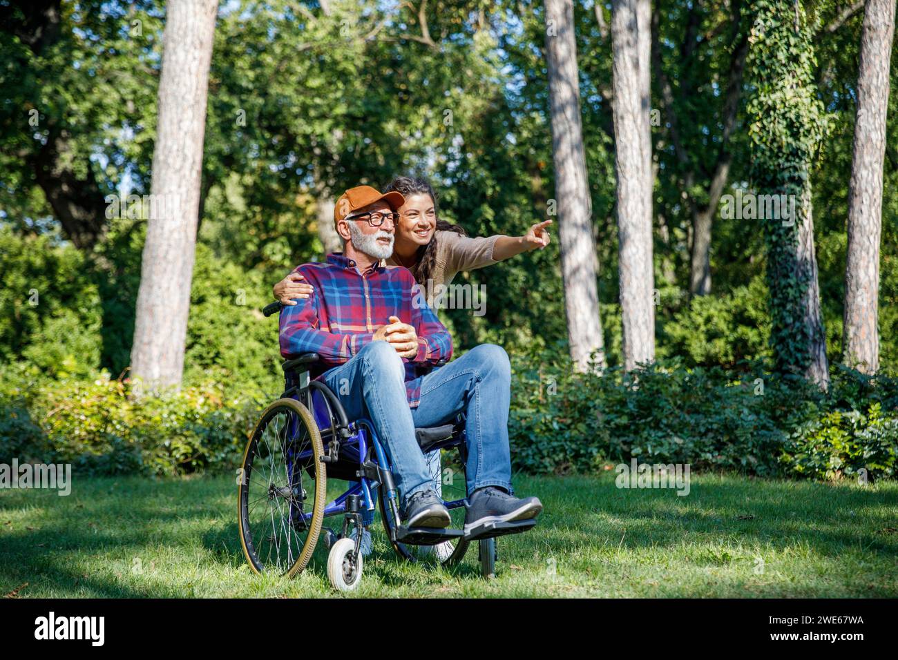Man in wheelchair service hi-res stock photography and images - Alamy