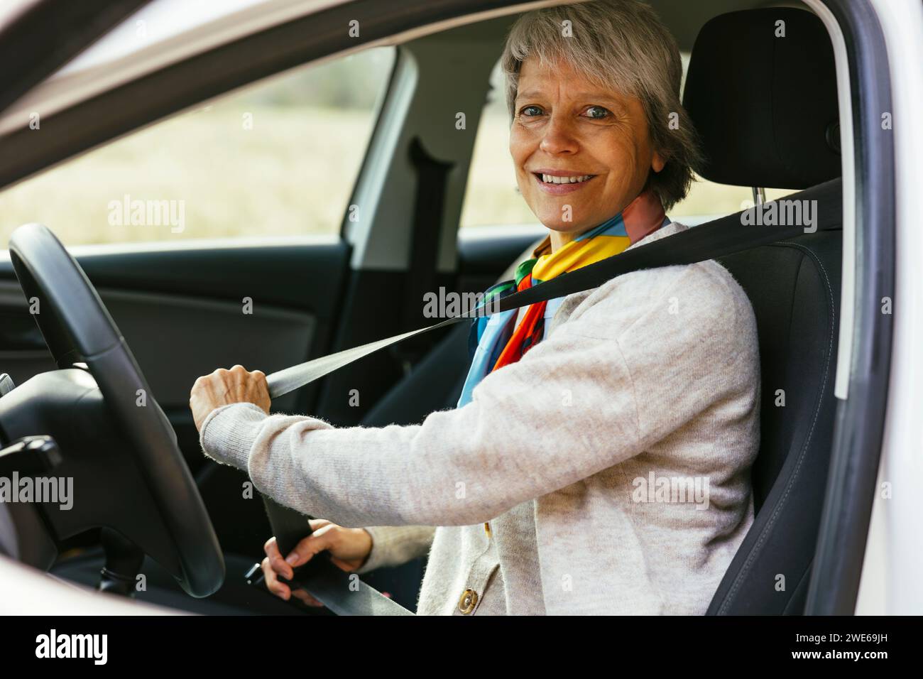 Woman adjusting car seat hi-res stock photography and images - Alamy
