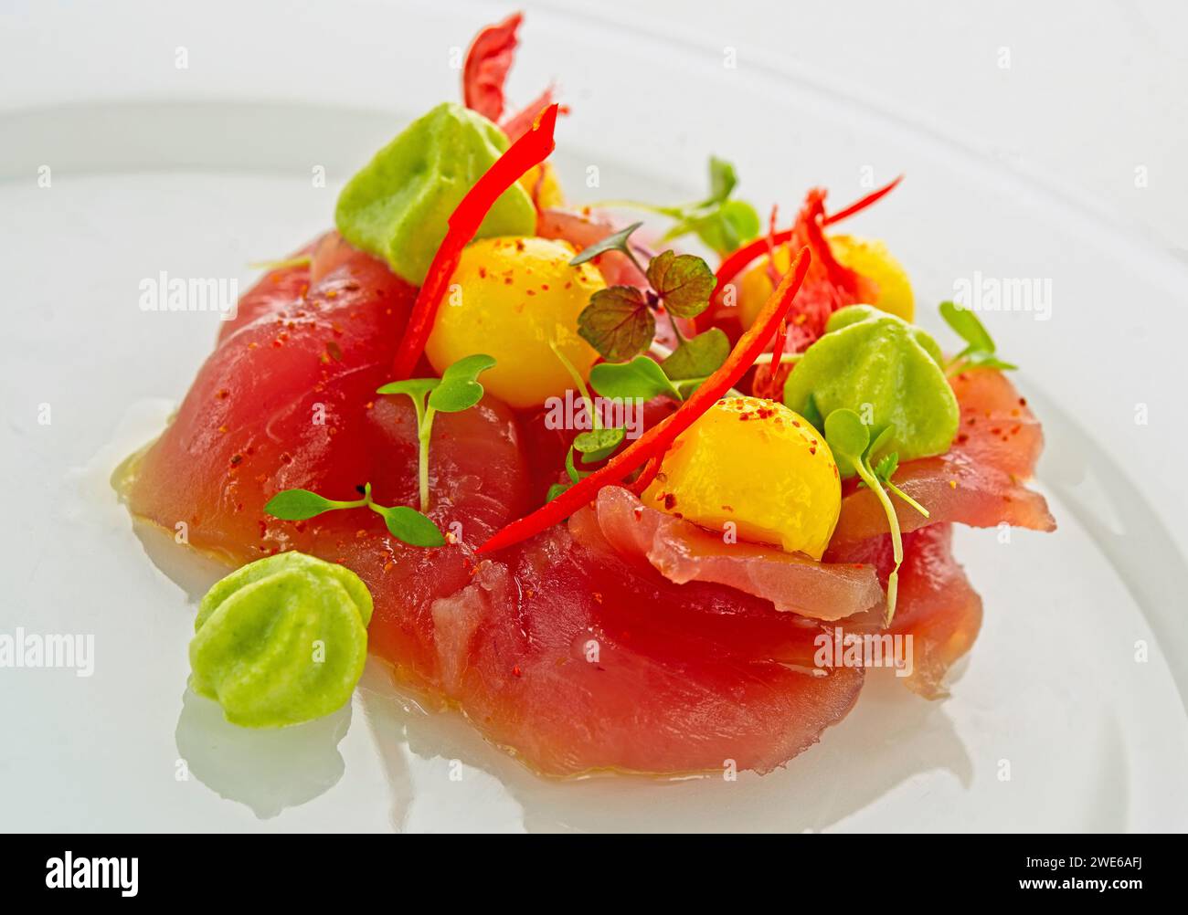 Yellowfin tuna carpaccio with melon Stock Photo