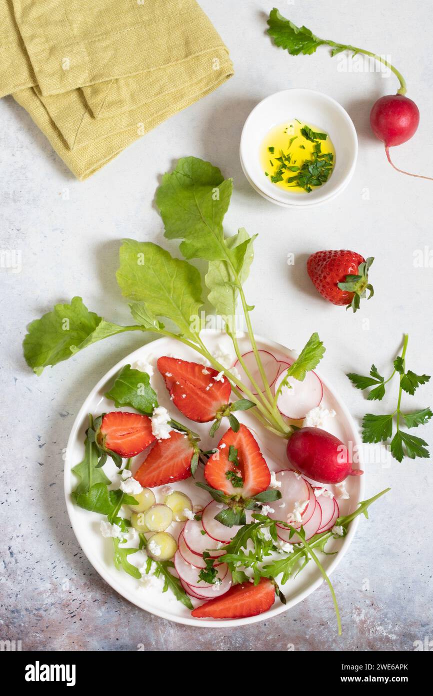 Strawberry and radish salad with feta Stock Photo