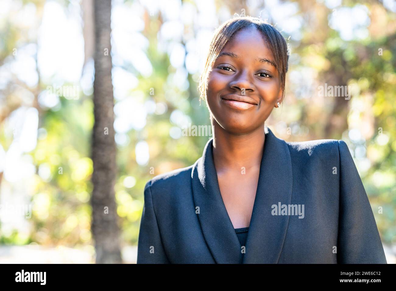 Woman park smiling wearing hi-res stock photography and images - Alamy