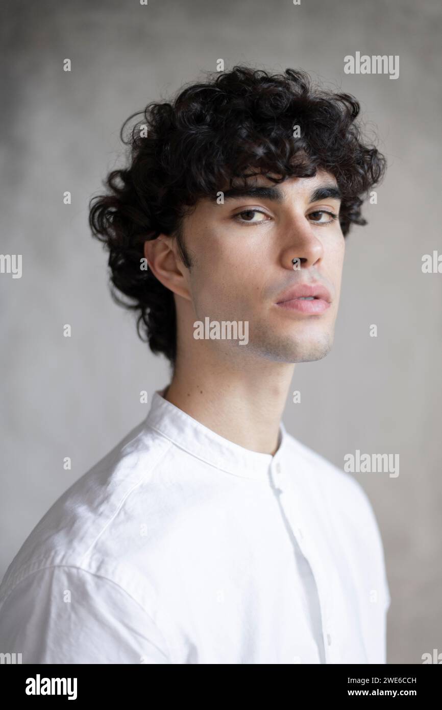 Male wearing gray shirt hi-res stock photography and images - Alamy
