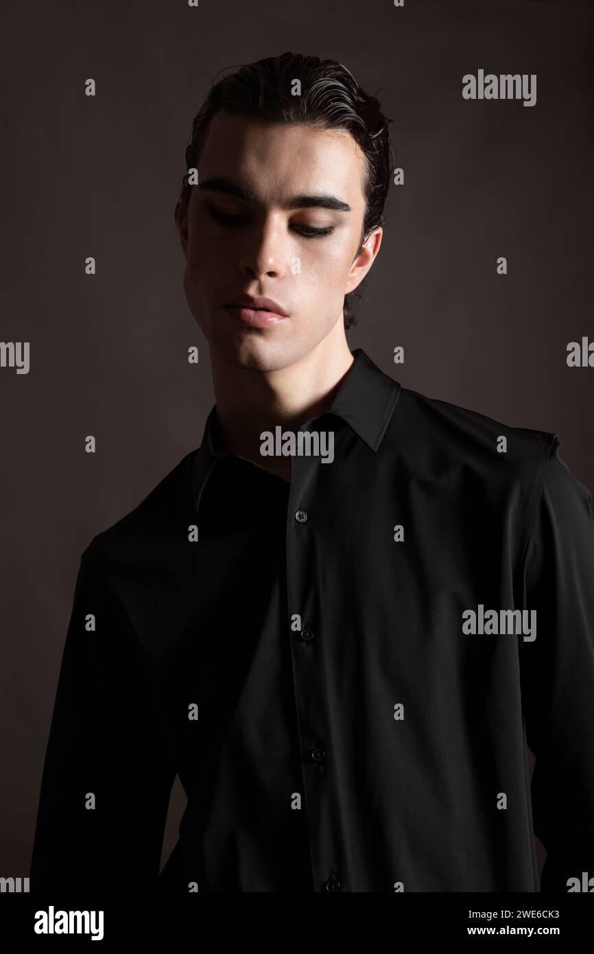 Young black man in shirt hi-res stock photography and images - Alamy