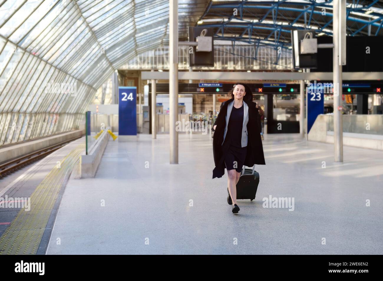 Mature woman on train station hi-res stock photography and images - Alamy