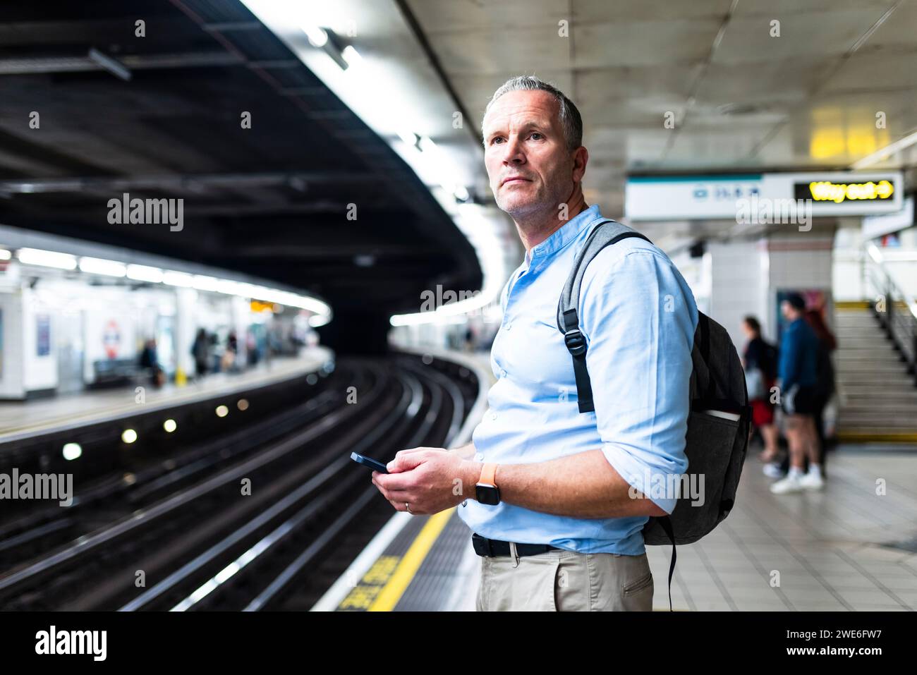 Train platform waiting three hi-res stock photography and images - Alamy