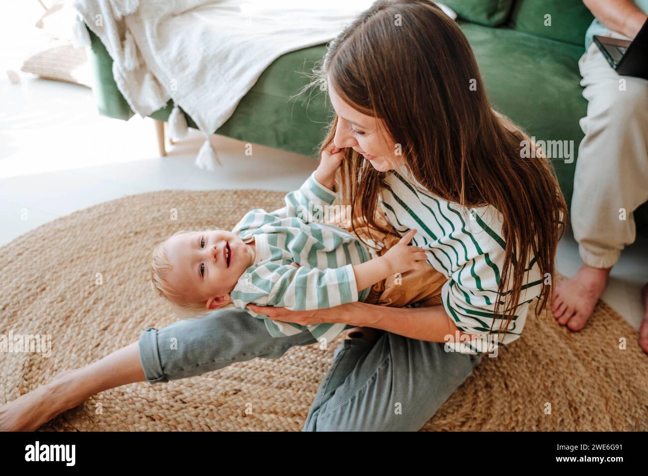 Mother holding son hi-res stock photography and images - Alamy