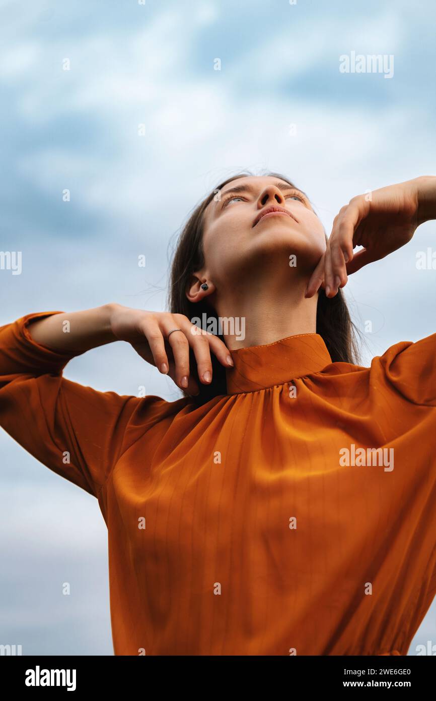 Woman arms raised sky hi-res stock photography and images - Alamy