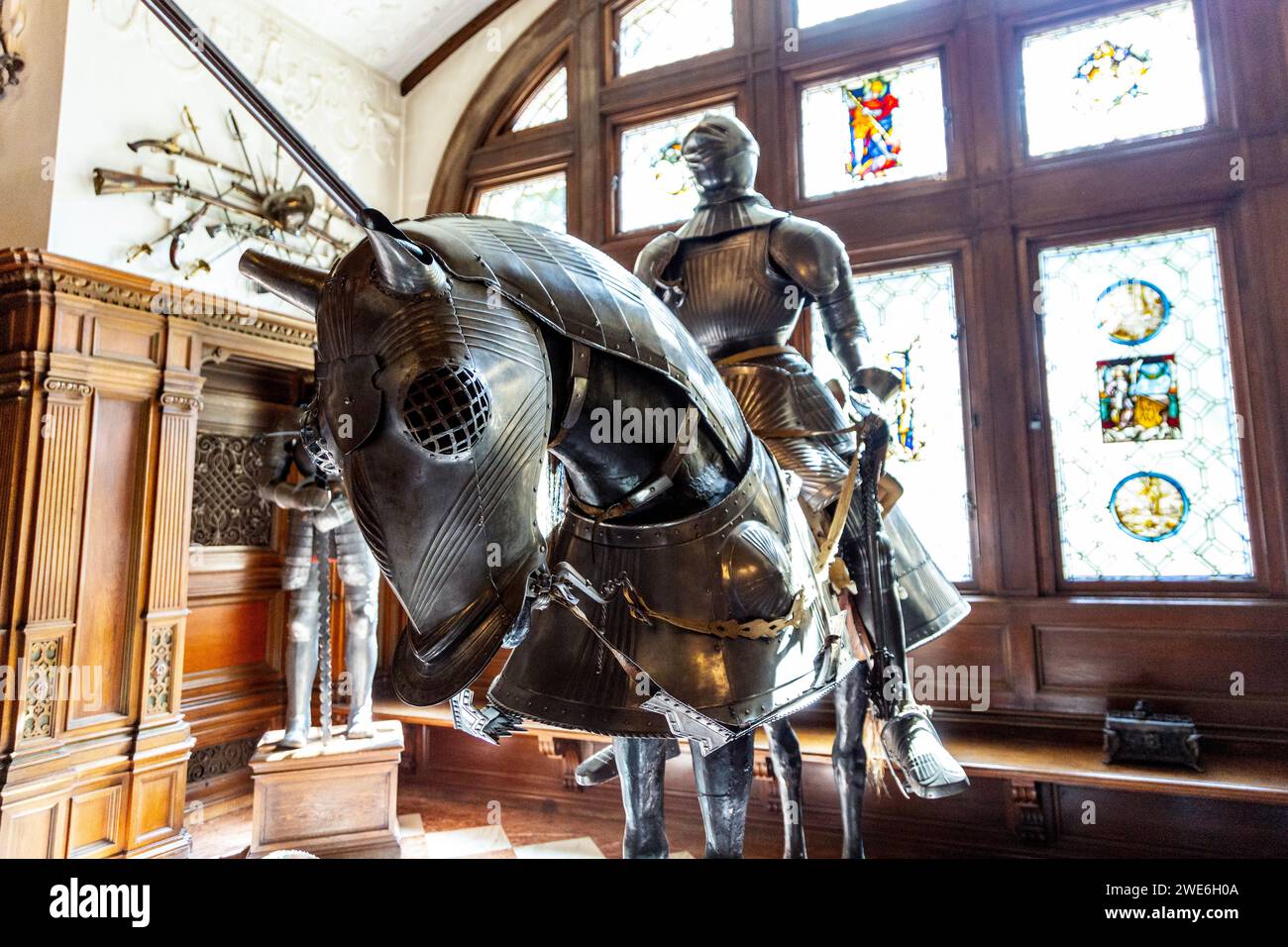 16th century full horse and knight Maximillian armour in the Armoury Halls of Peles Castle, Sinaia, Romania Stock Photo
