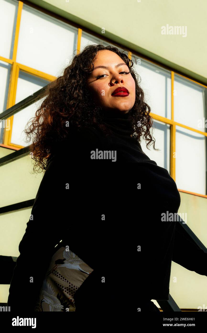 Black curly hair wearing hi-res stock photography and images - Alamy