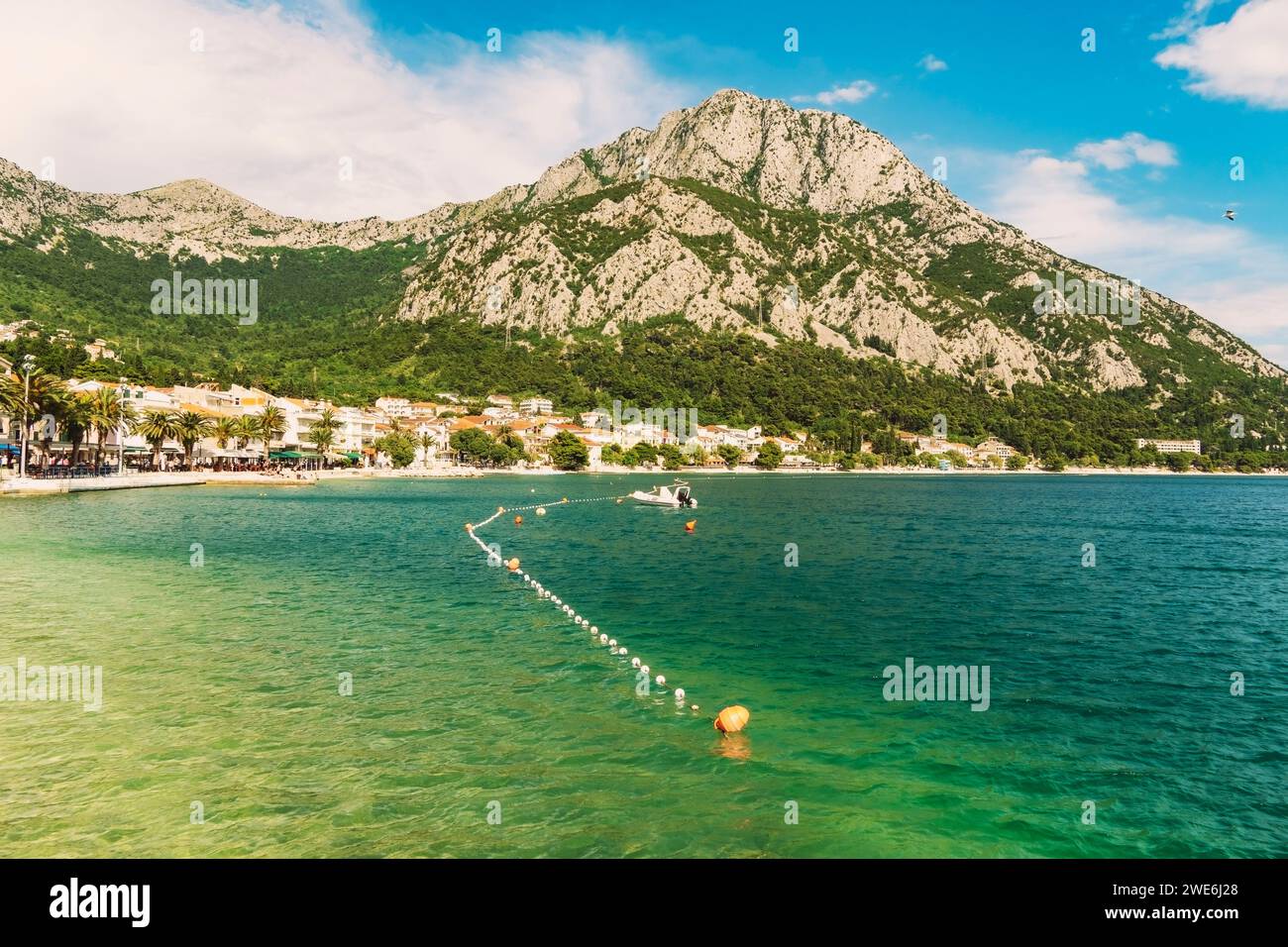 Croatia, Split-Dalmatia County, Drvenik, Buoys in front of coastal ...