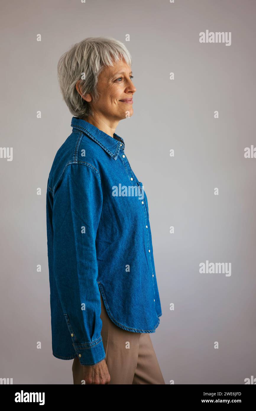 Woman wearing gray shirt hi-res stock photography and images - Alamy