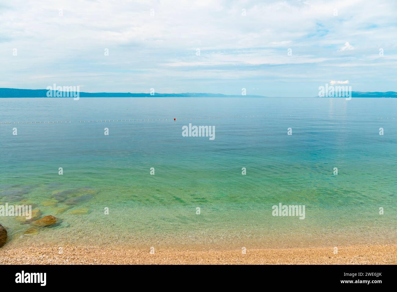 Croatia, Split-Dalmatia County, Podgora, Placid Adriatic shore Stock Photo