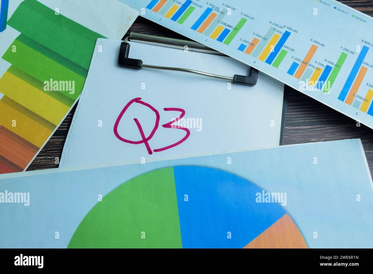 Concept of Q3 3rd Quarter Period write on paperwork isolated on wooden ...