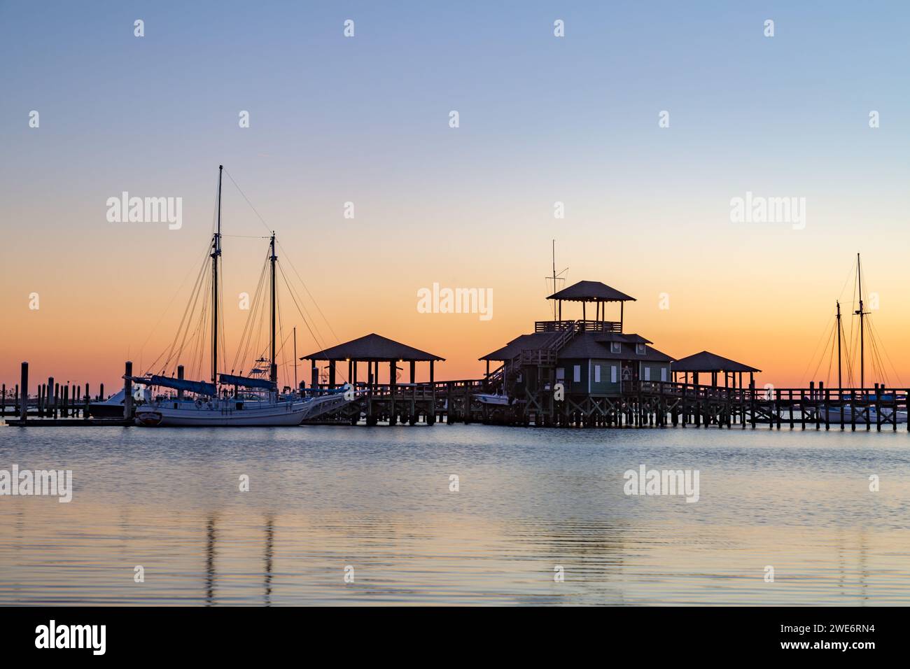 Biloxi Schooner Pier Complex houses two replica shallow-draft sailing ships used for charters along the Mississippi Gulf Coast in Biloxi Mississippi Stock Photo