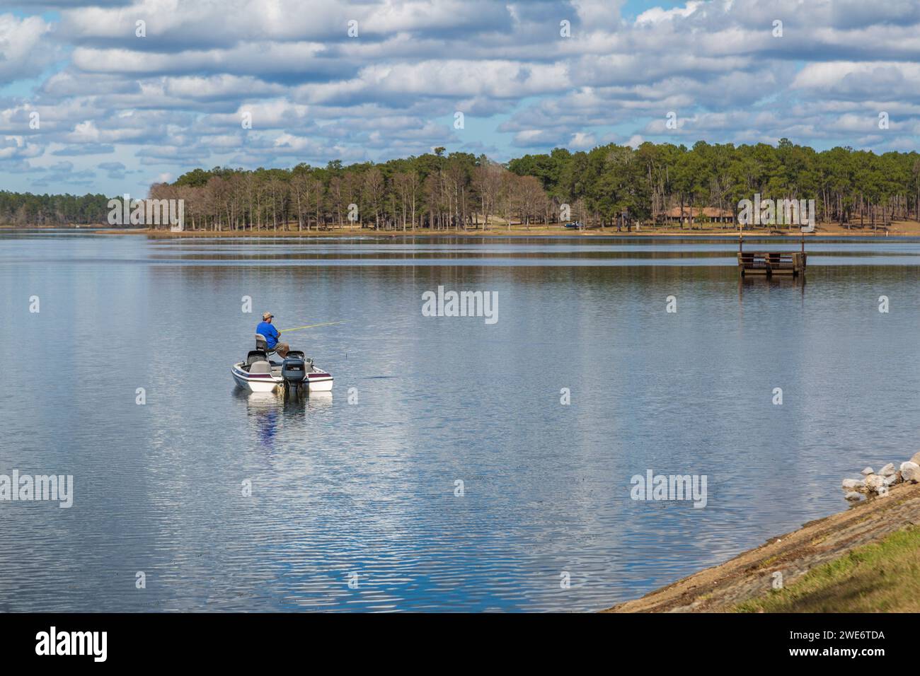 Park visitor fishing in the Flint Creek Reservoir at Flint Creek Water