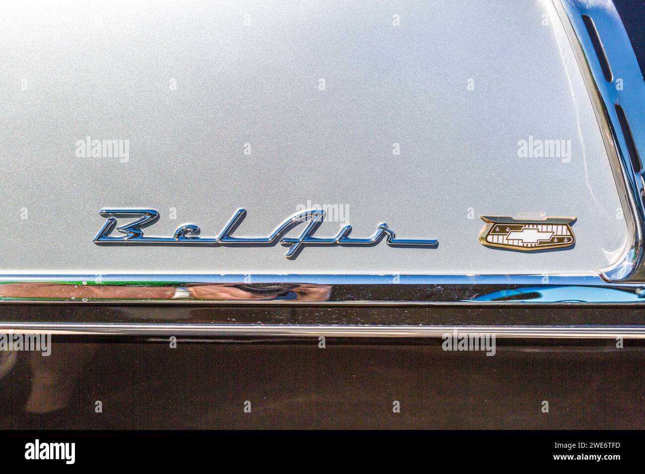 Chevrolet logo and “Bel Air” emblem on fender of classic car Stock