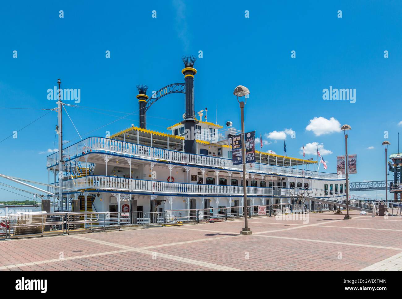 Historic Creole Queen paddlewheel riverboat at dock on the Mississippi River in New Orleans Stock Photo