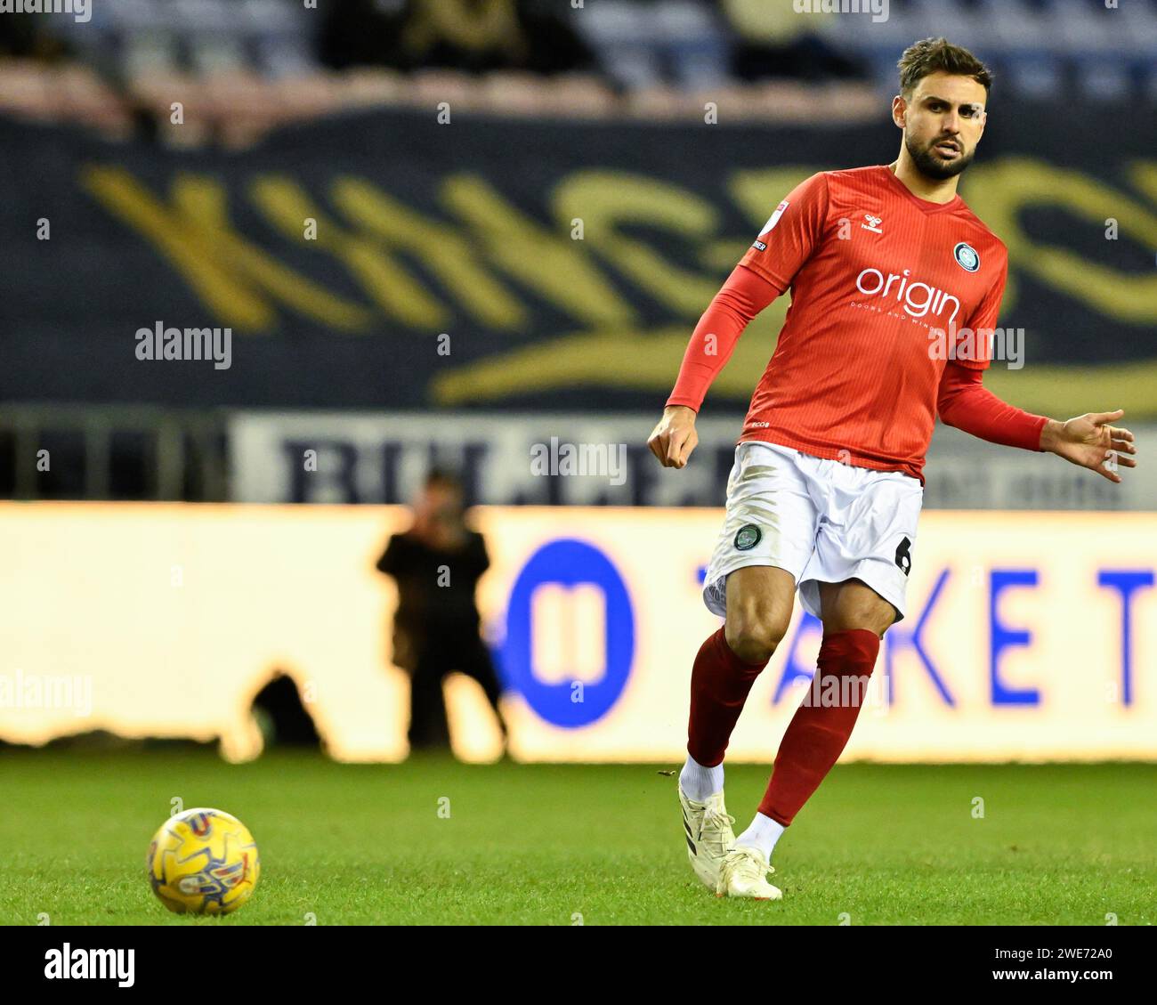 Ryan Tafazolli of Wycombe Wanderers passes the ball, during the Sky Bet League 1 match Wigan Athletic vs Wycombe Wanderers at DW Stadium, Wigan, United Kingdom, 23rd January 2024  (Photo by Cody Froggatt/News Images) Stock Photo