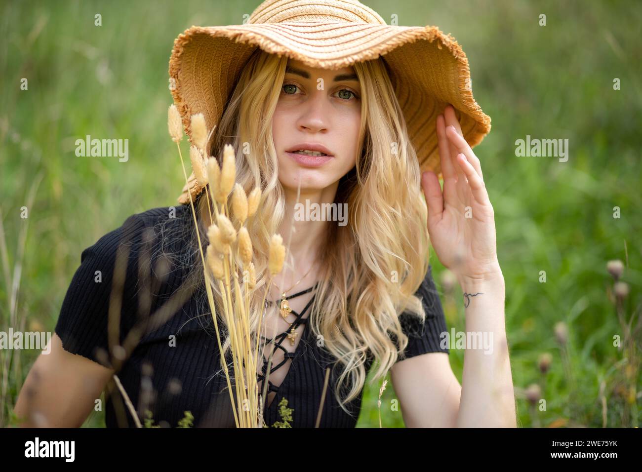 portrait of a girl in a straw hat. Natural beauty and lightness, boho ...