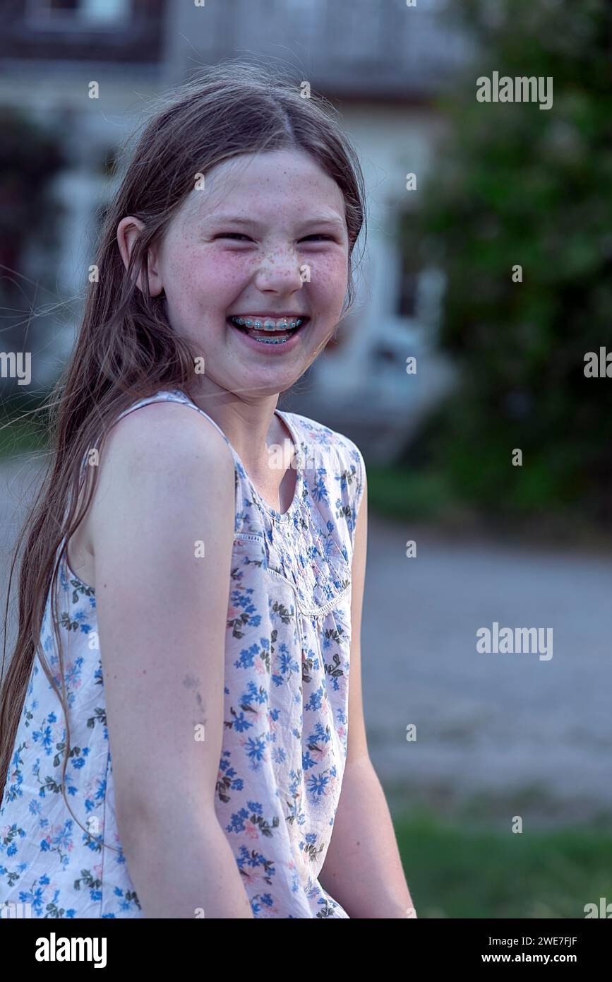 Laughing girl, 10 years old, with braces, Mecklenburg-Vorpommern, Germany Stock Photo