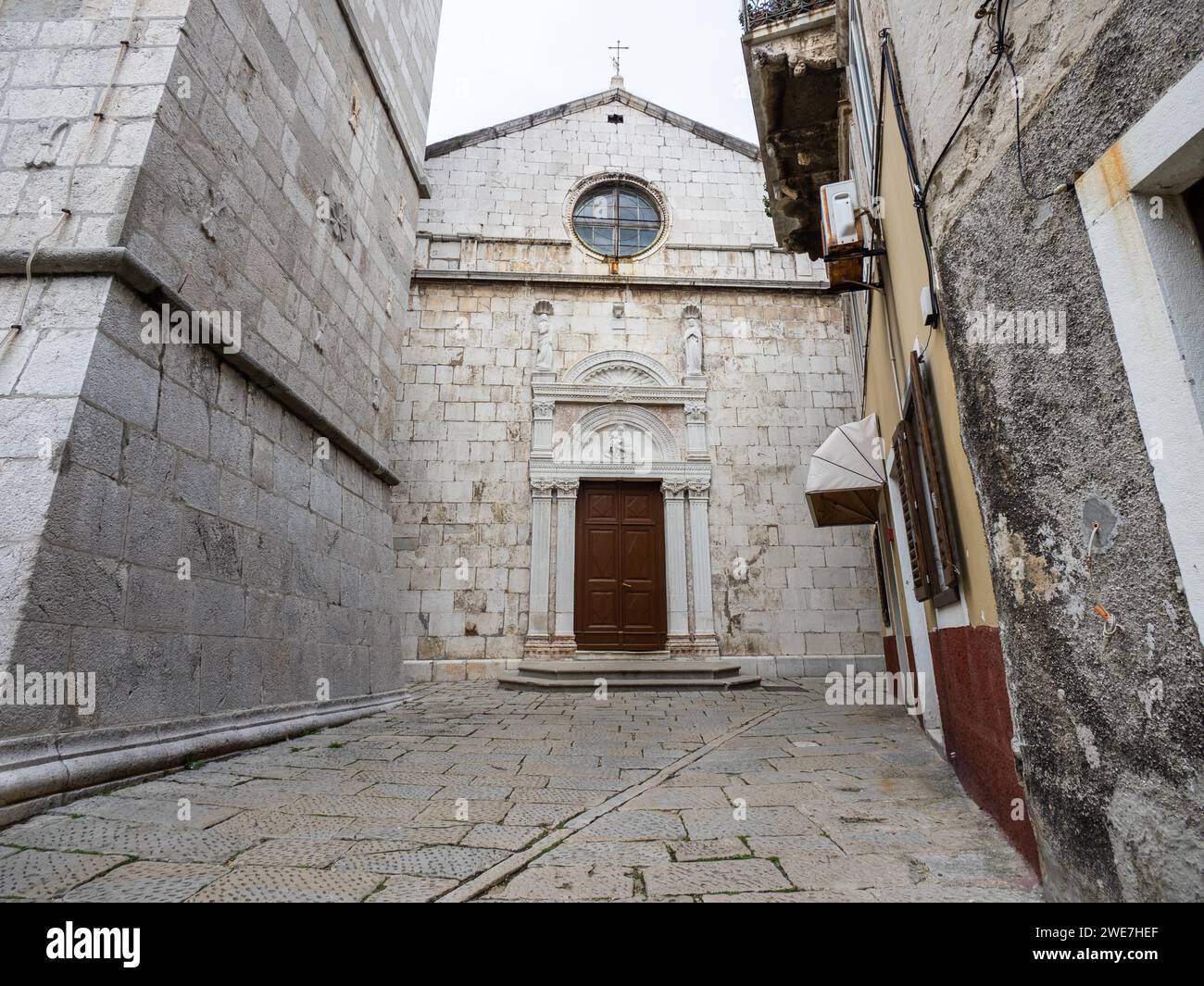 Grad Cres Facade with entrance gate, Venetian cathedral of the town of Cres ...