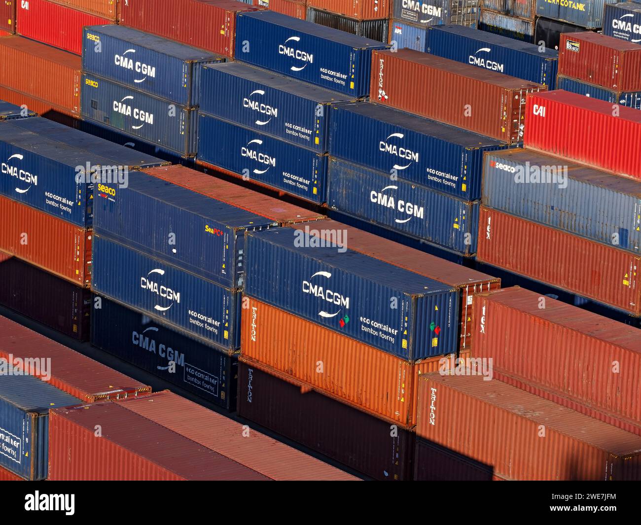 Shipping Industry / Shipping containers stacked in the Port of Noumea, New Caledonia. Stock Photo