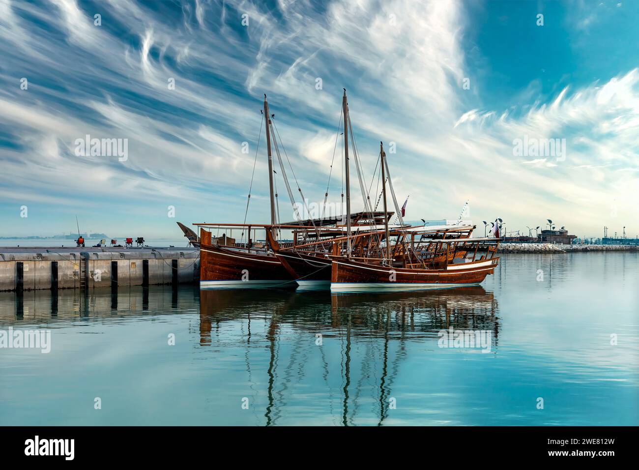 traditional dhow on Doha Corniche, a waterfront promenade along Doha Bay in the capital city of Qatar Stock Photo