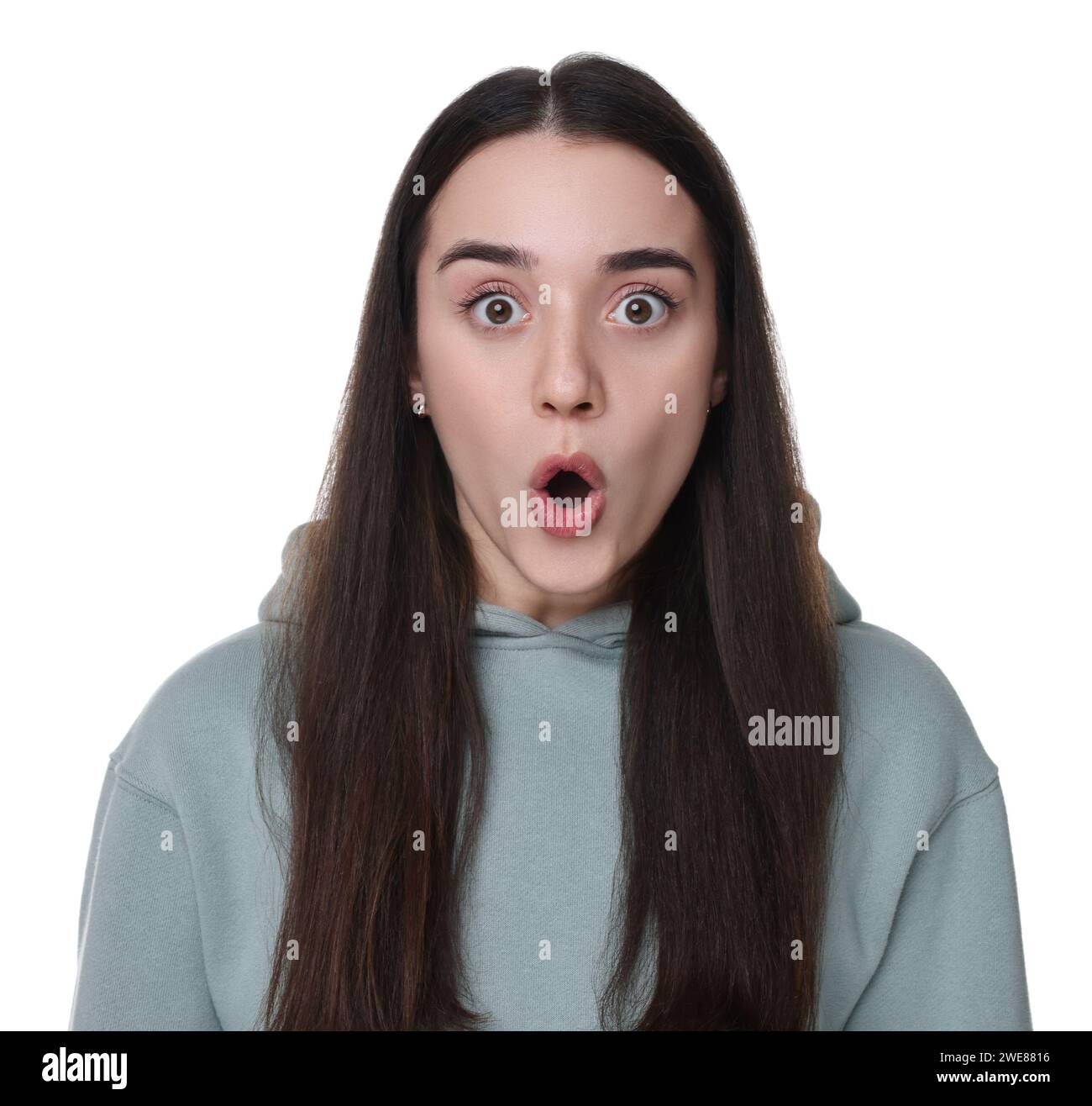 Portrait of surprised young woman on white background Stock Photo - Alamy