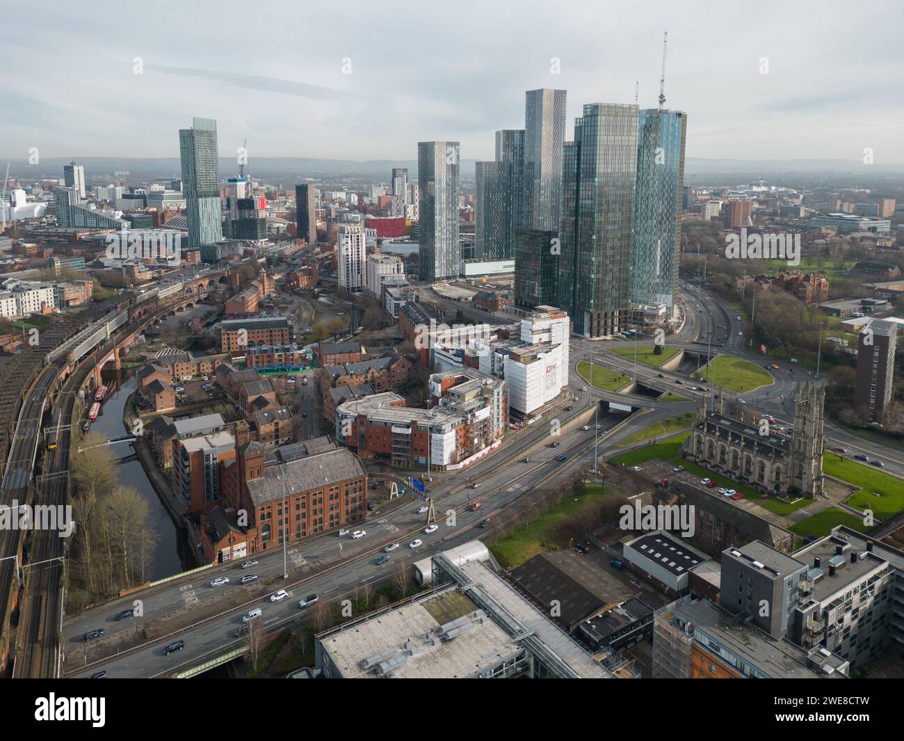 Aerial image of Manchester, UK looking towards Castlefield, Deansgate Square, The Blade, Crown St, Beetham Tower and Manchester city centre Stock Photo