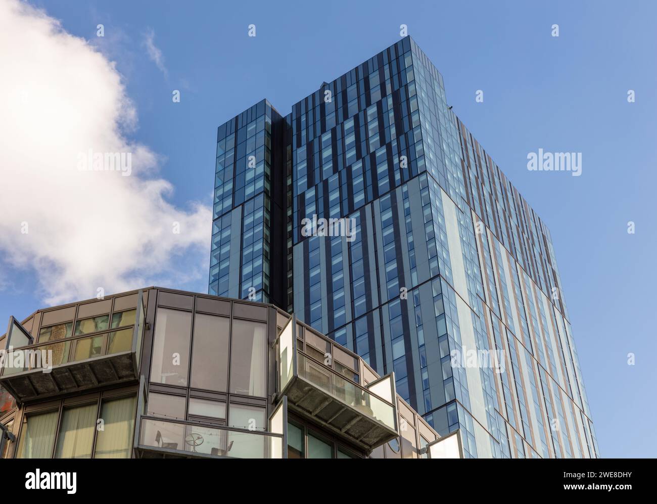 Cortland residential tower, part of the wider Greengates development in Salford, UK with the Urbito apartment building in the foreground Stock Photo