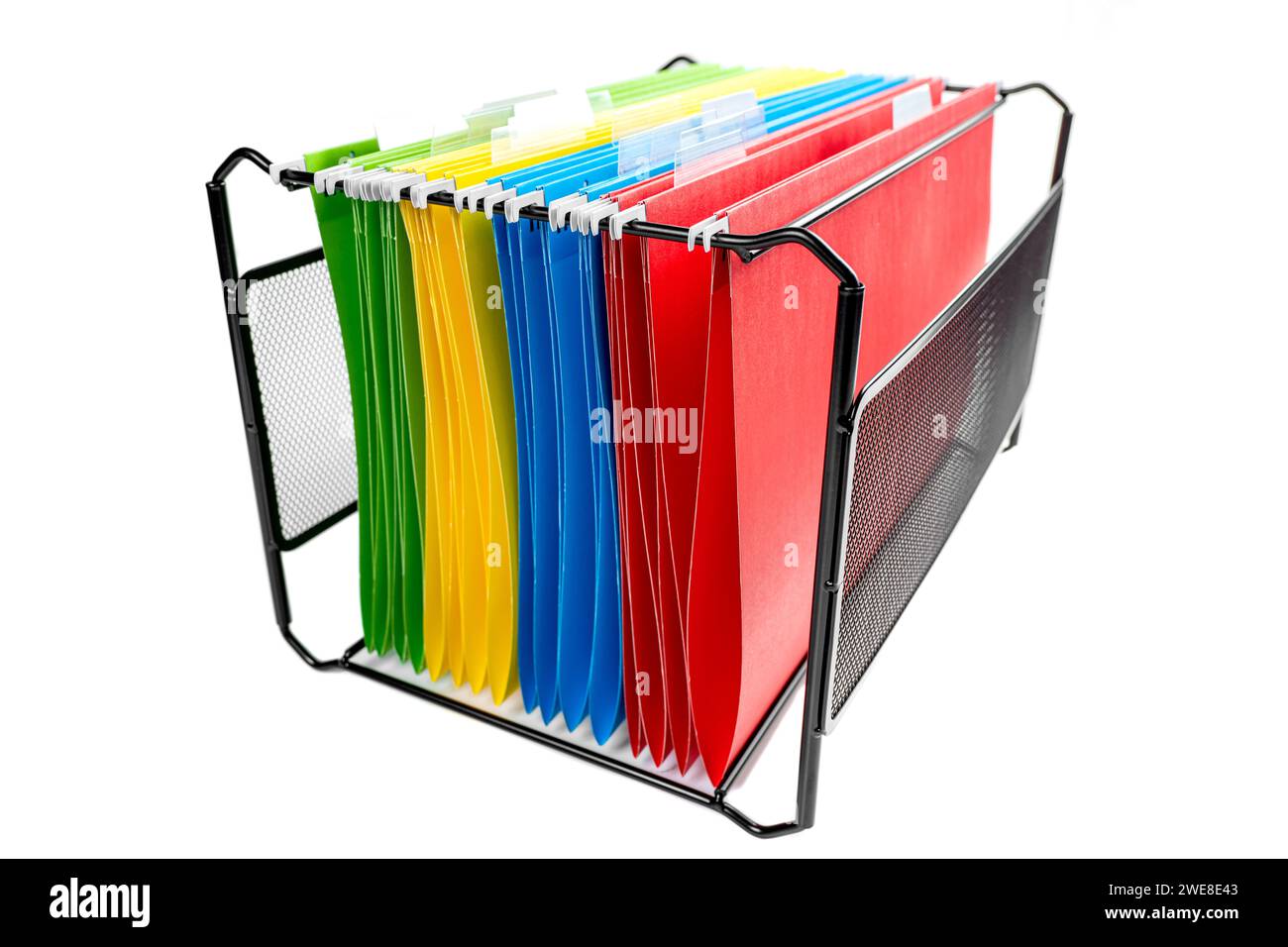 Closeup view of the colorful hanging file folder on the file organizer isolated over a white background Stock Photo