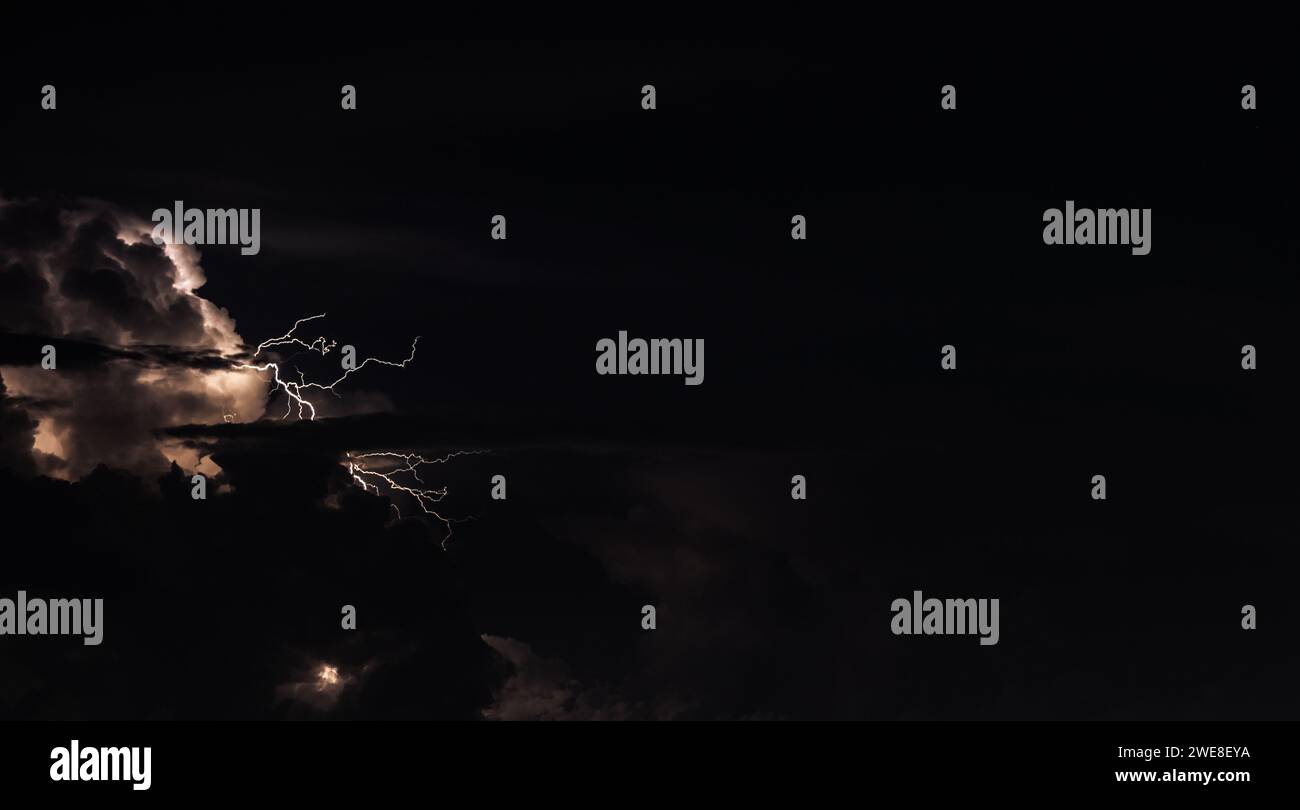 Photography of lightning in the dark night sky Stock Photo - Alamy